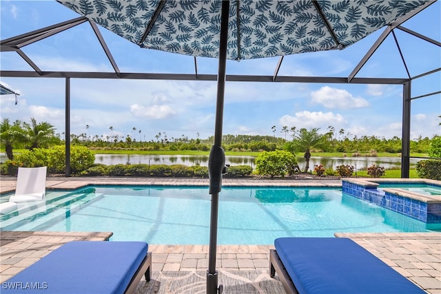 view of swimming pool featuring an in ground hot tub, glass enclosure, and a patio area