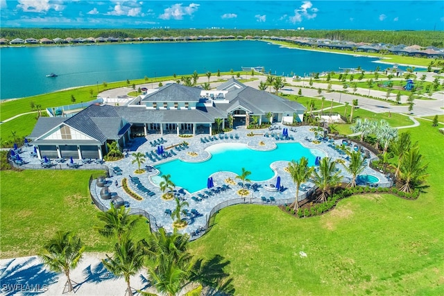 birds eye view of property featuring a water view