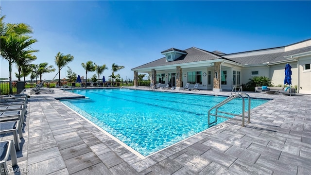 view of swimming pool featuring a patio area