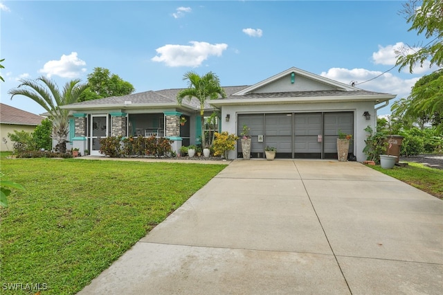 ranch-style house with a garage and a front yard