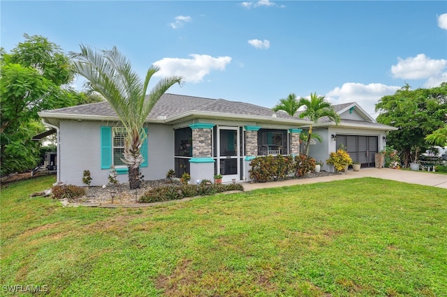 single story home with a front yard and a garage