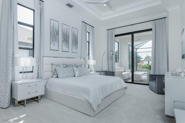 carpeted bedroom featuring ceiling fan, access to exterior, and ornamental molding