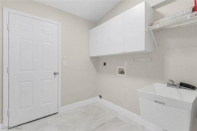 washroom featuring sink, hookup for a washing machine, cabinets, and hookup for an electric dryer