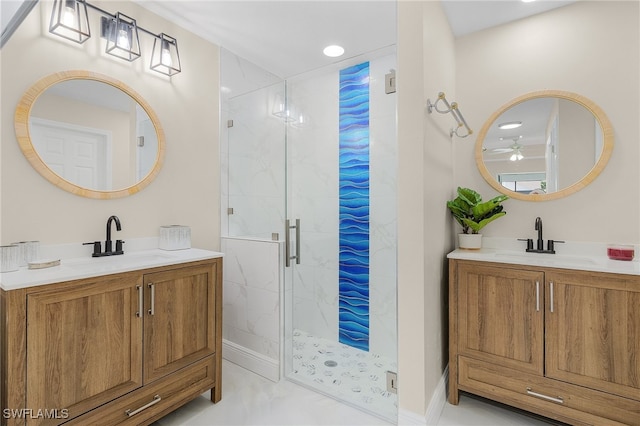 bathroom with vanity and a shower with shower door