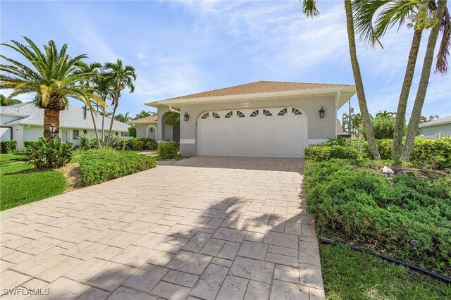 view of front of property with a garage