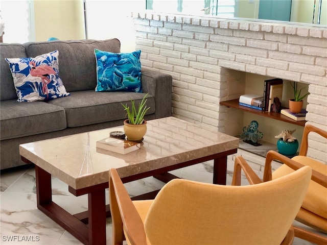 interior space featuring light tile patterned floors and a brick fireplace