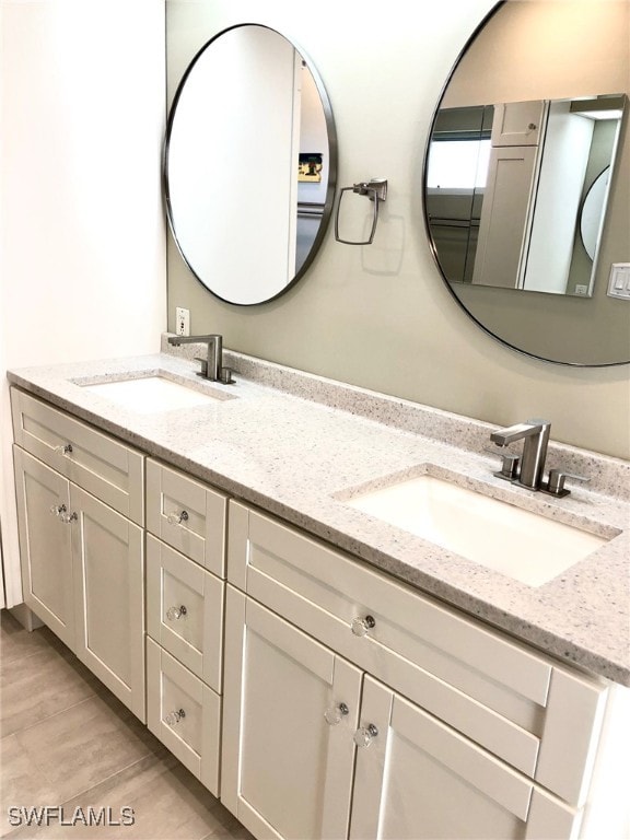 bathroom featuring vanity and hardwood / wood-style floors