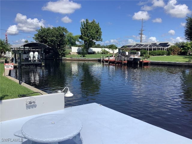 dock area with a water view