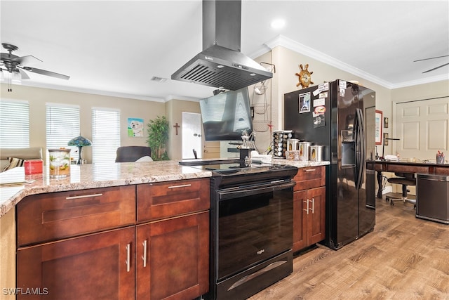 kitchen with light hardwood / wood-style flooring, black appliances, light stone countertops, ceiling fan, and island exhaust hood