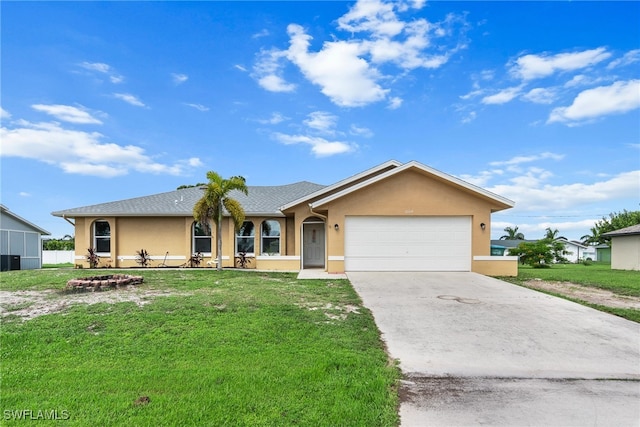 ranch-style house featuring a front yard and a garage