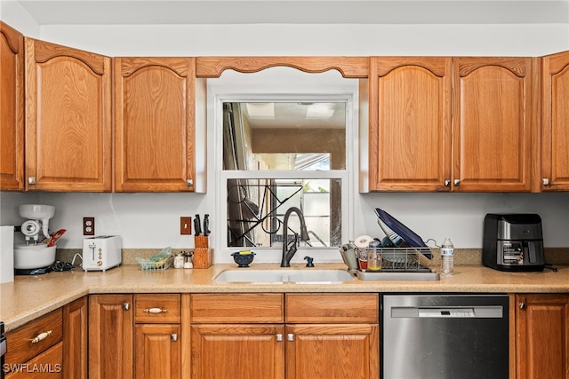 kitchen with stainless steel dishwasher and sink