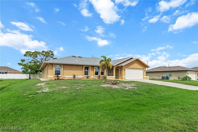 ranch-style home featuring a garage and a front yard