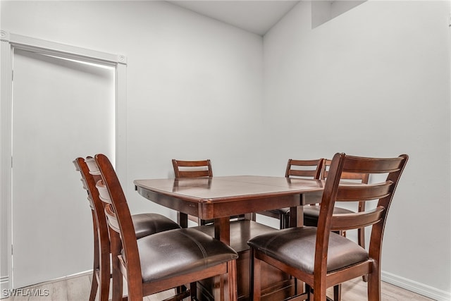 dining space featuring light hardwood / wood-style floors