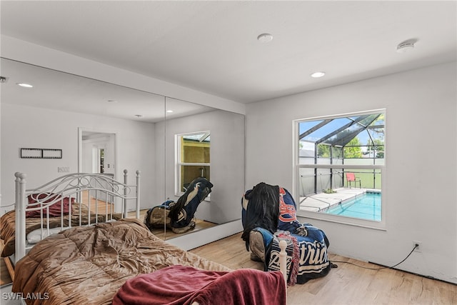 bedroom with light hardwood / wood-style flooring