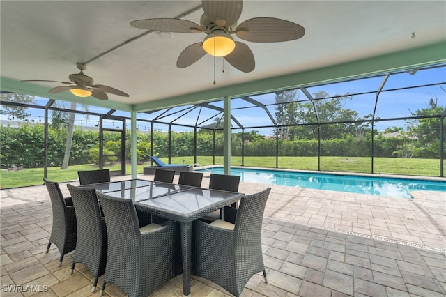 exterior space featuring ceiling fan, a lanai, and a patio