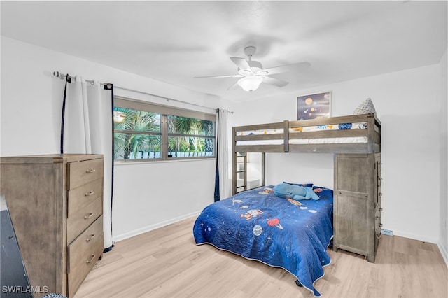 bedroom featuring ceiling fan and light hardwood / wood-style floors