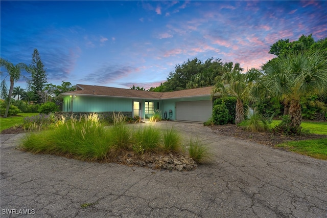 view of front of property with a garage