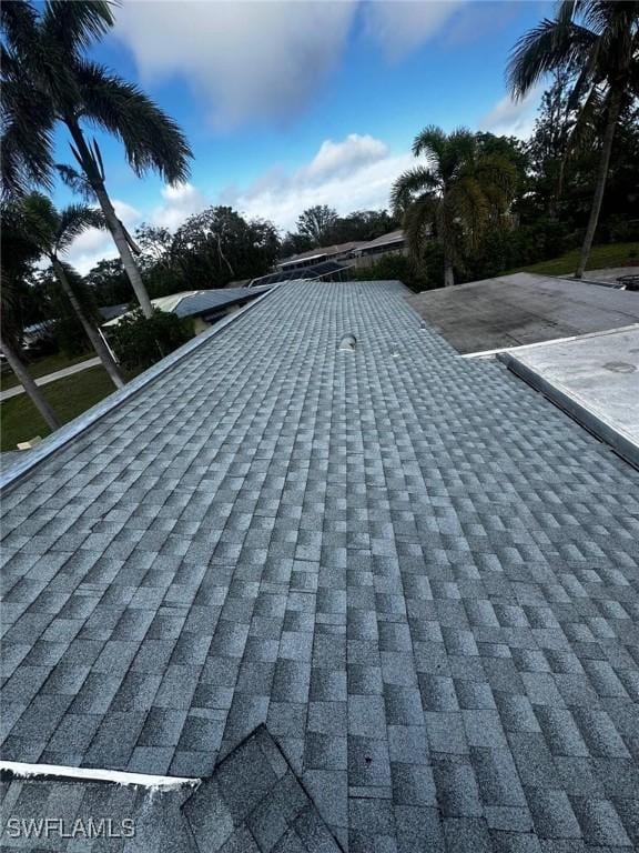 details featuring a shingled roof