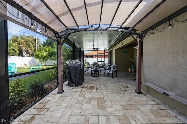 706 SW 9th Ct, Cape Coral, FL 33991 - fenced backyard with a ceiling fan, grilling area, and a patio area