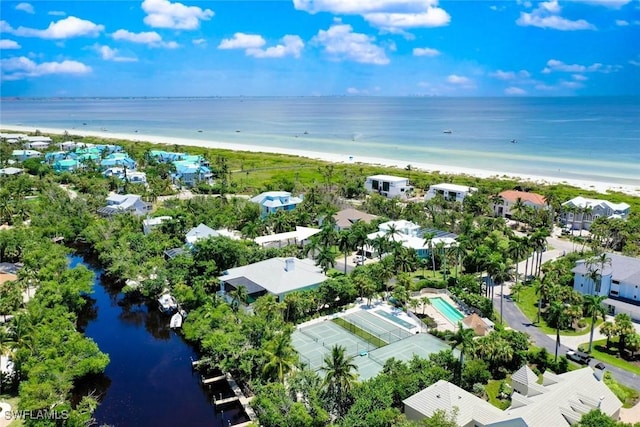 bird's eye view with a beach view and a water view