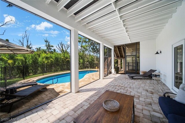 view of swimming pool featuring a patio