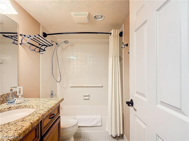 full bathroom featuring toilet, shower / tub combo with curtain, a textured ceiling, and vanity