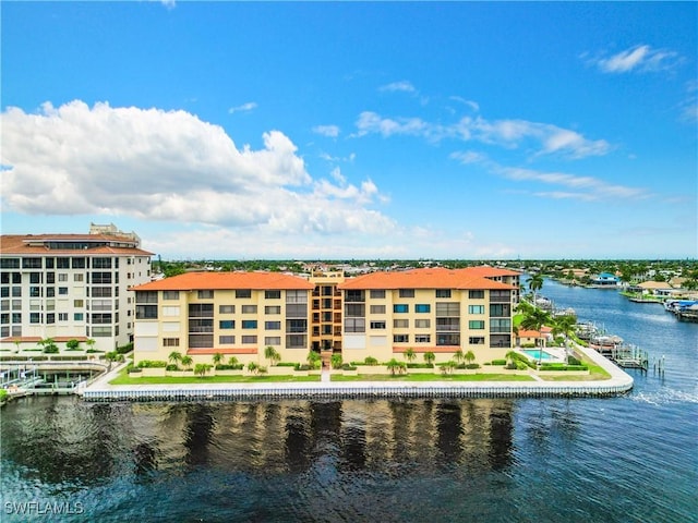 birds eye view of property featuring a water view