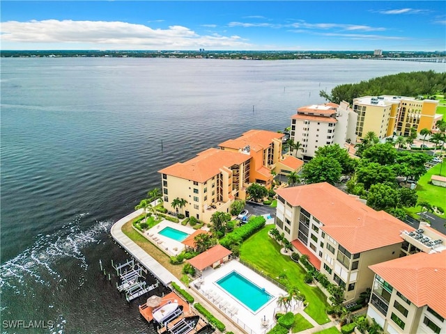 birds eye view of property featuring a water view