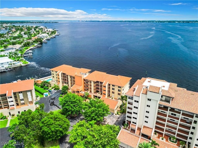 bird's eye view with a water view