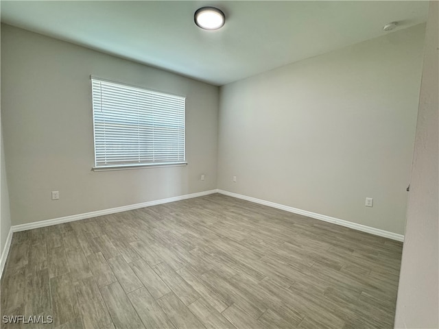 empty room featuring light hardwood / wood-style floors