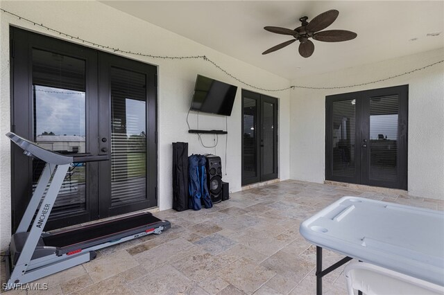 view of patio featuring ceiling fan and french doors