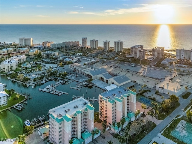 aerial view at dusk with a water view