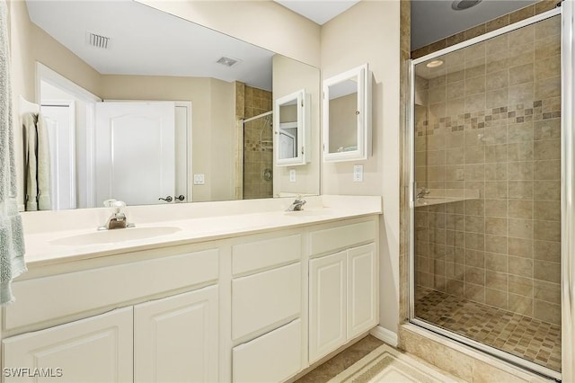 150 Lenell Rd Unit 503, Fort Myers Beach, FL 33931 - full bath with a sink, tile patterned floors, a shower stall, and visible vents