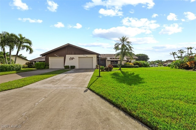 single story home with a garage and a front yard