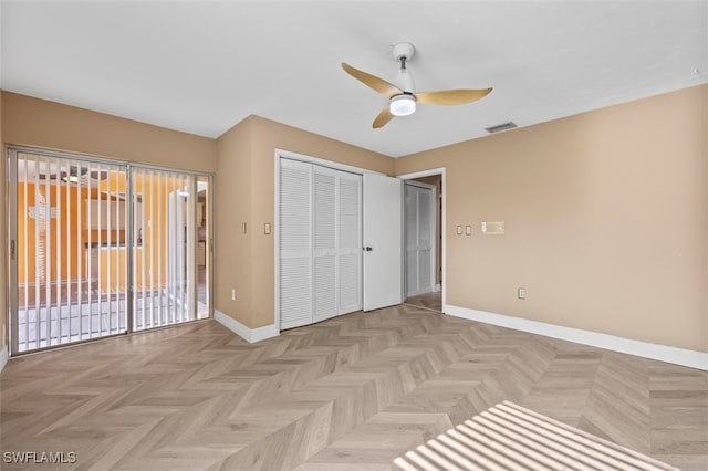 unfurnished bedroom featuring light parquet floors, access to outside, ceiling fan, and a closet