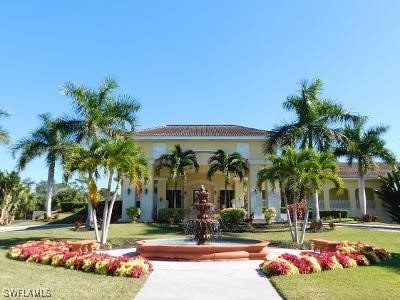 mediterranean / spanish-style home featuring a front lawn