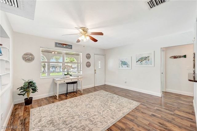 entrance foyer with wood-type flooring and ceiling fan