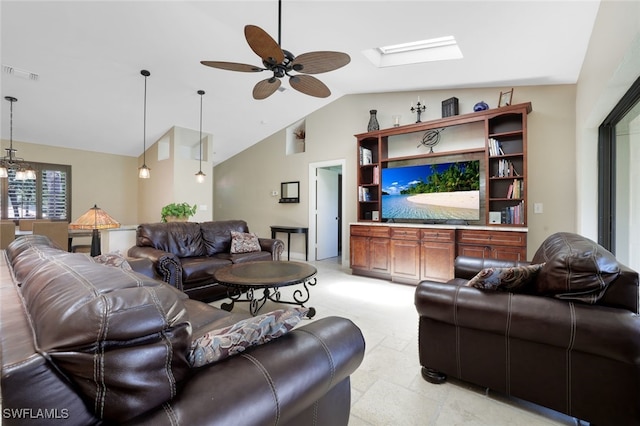 living room featuring ceiling fan with notable chandelier and vaulted ceiling