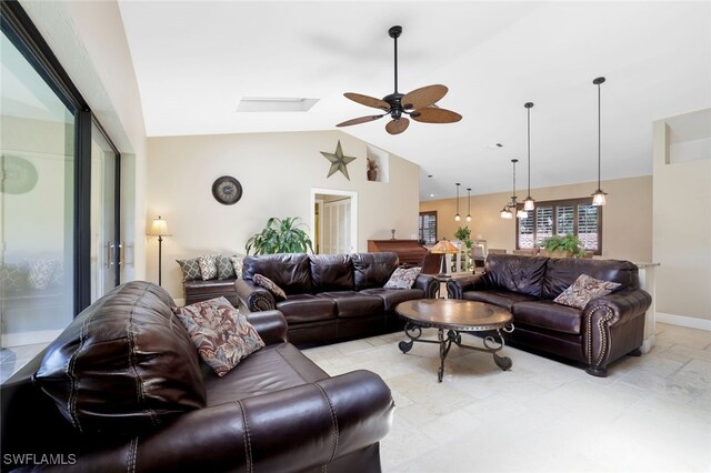 living room featuring high vaulted ceiling and ceiling fan