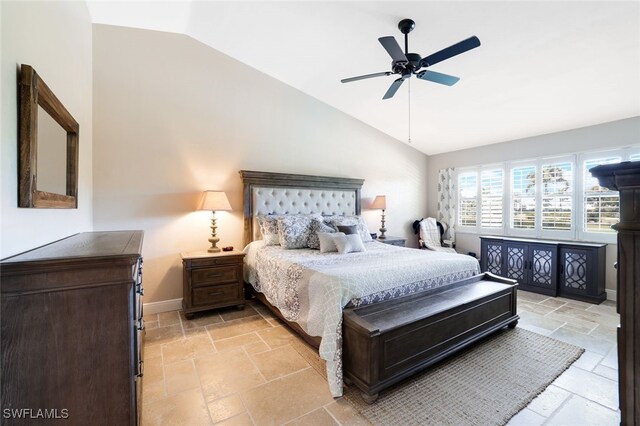 bedroom featuring lofted ceiling and ceiling fan