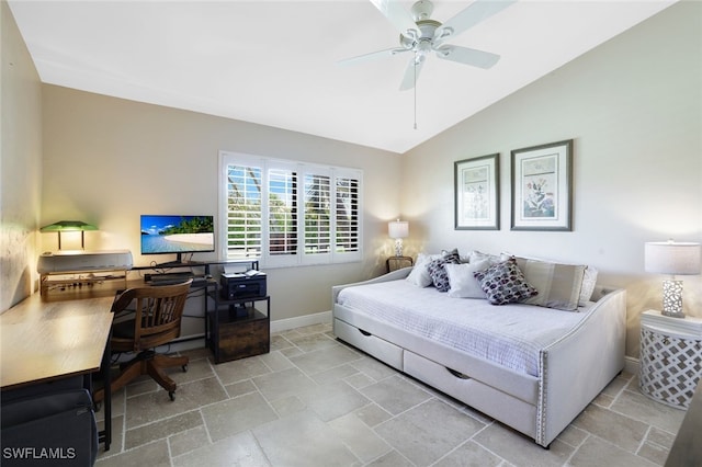 bedroom with ceiling fan and vaulted ceiling