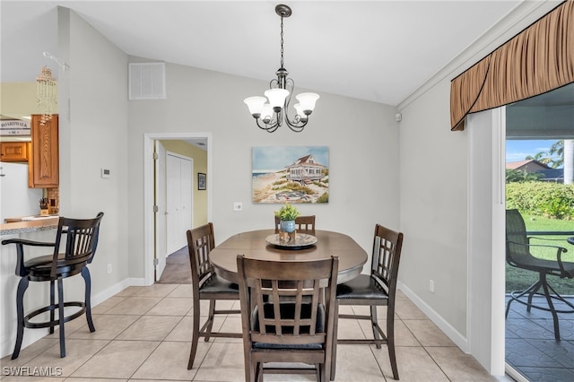 dining area with light tile patterned flooring, lofted ceiling, and an inviting chandelier