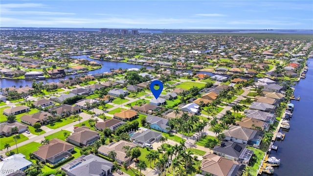 drone / aerial view featuring a water view