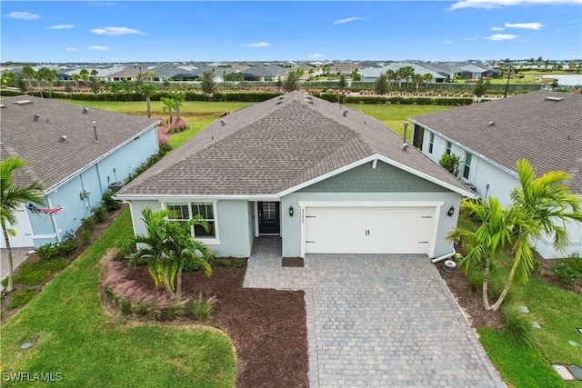 single story home featuring a garage