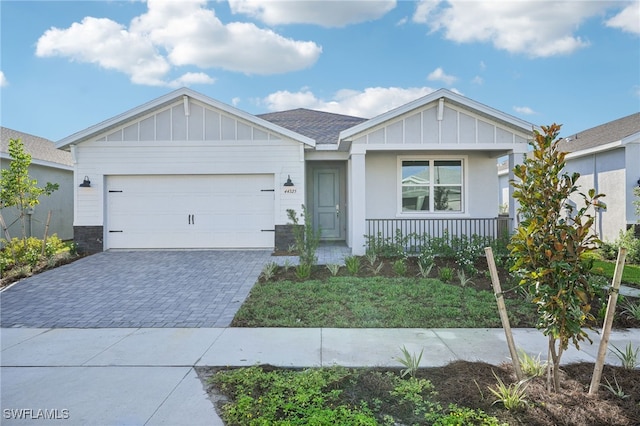 view of front of property with a garage