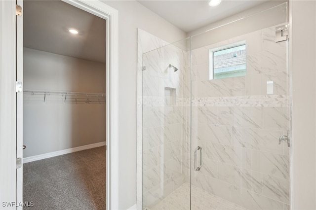 bathroom featuring an enclosed shower