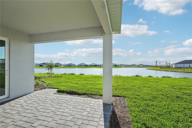 view of patio featuring a water view