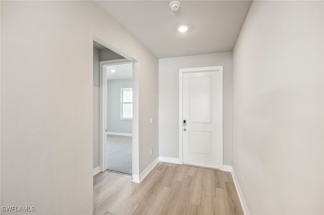 hall featuring light hardwood / wood-style flooring