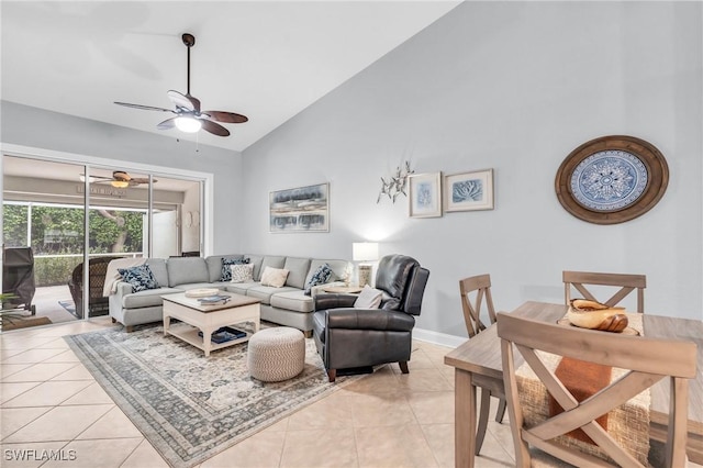 tiled living room featuring lofted ceiling and ceiling fan