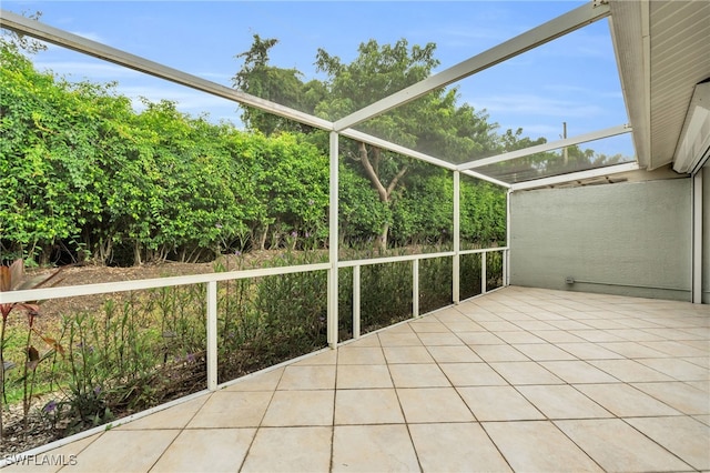 view of patio / terrace featuring a lanai